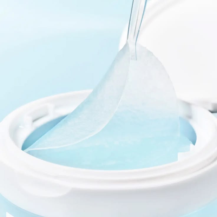 SKIN1004 Madagascar Centella Hyalu-Cica Jelly-Fit Ampoule Pad - frasco con líquido