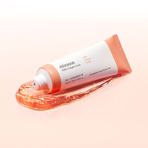 Mixsoon PDRN Collagen Cream - tubo con textura naranja fondo melocotón